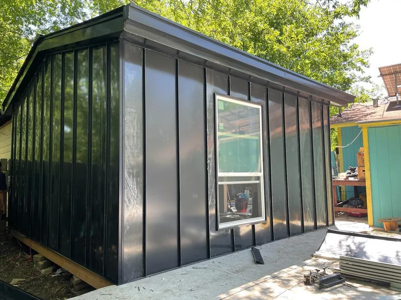 Black standing seam metal wall panels for Roof Inspection in Pleasure Point