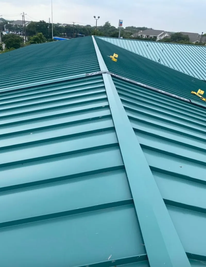 Green commercial metal roof ridge and valley for Metal Roof Repair in Pleasure Point